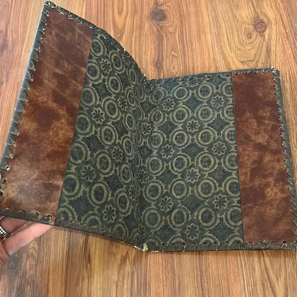 Vintage tooled brown leather lion crest made in Italy book cover